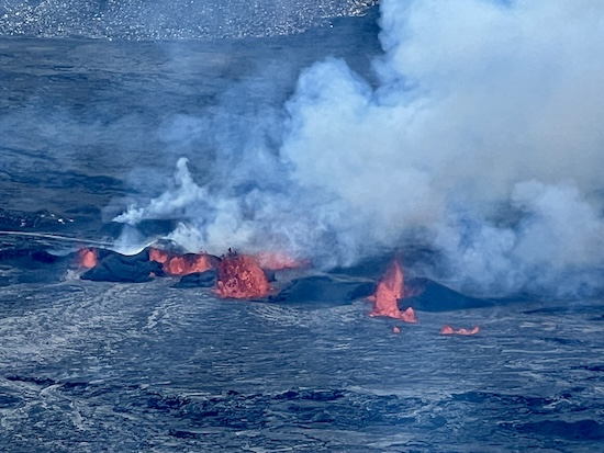 Small lava foutains erupt on Kilauea's caldera floor.