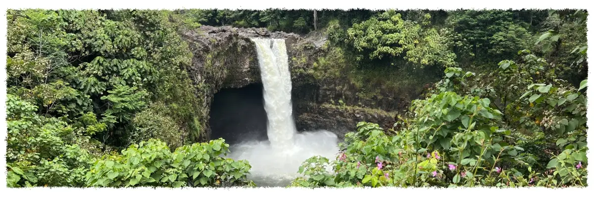 Rainbow Falls  pouring into a lush rainforest pool on the Big Island of Hawai‘i.